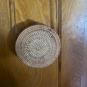 Purse, structured and woven.